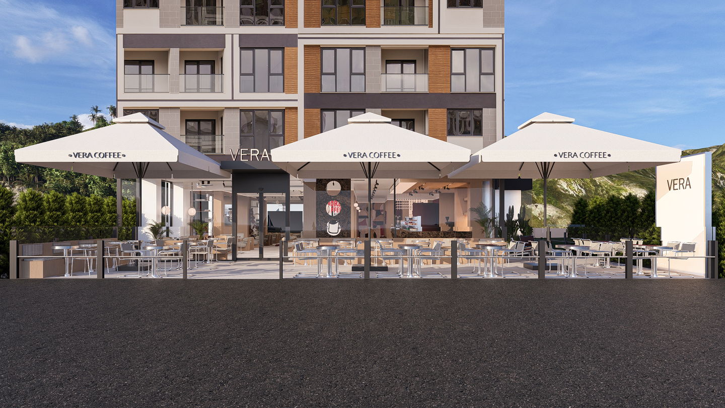 VERA COFFEE dış cephe: VERA COFFEE şemsiyeleriyle gölgelenmiş teras